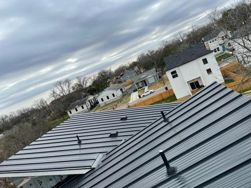 Standing seam metal roof panels with vents for Skylight Repair in Gladewater